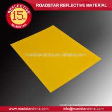 Specialized acrylic reflective sheeting for roadway safety badge